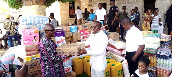 Alban Bagbin (2nd right), Speaker of Parliament handing over the items to Rev Br Cosmos Kanmwaa, Director of Catholic Action for Street Children. Picture: BENJAMIN XORNAM GLOVER